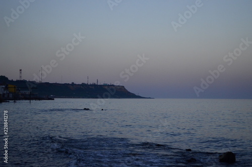 sailing ship in the sea at sunset