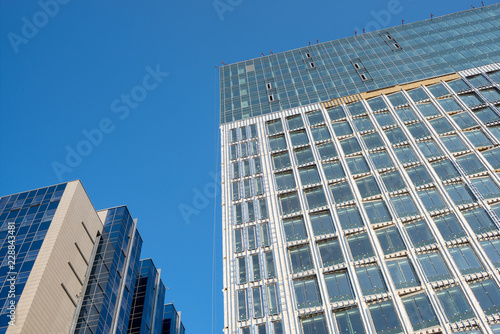 High office building under construction and blue sky