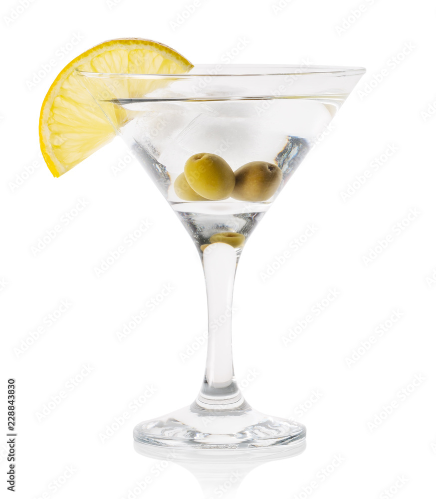 Martini with ice and olives in a transparent glass