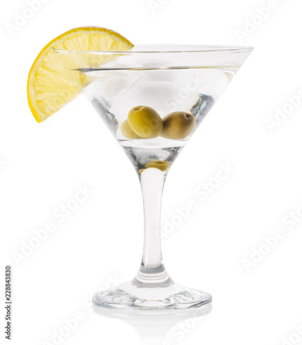 Martini with ice and olives in a transparent glass