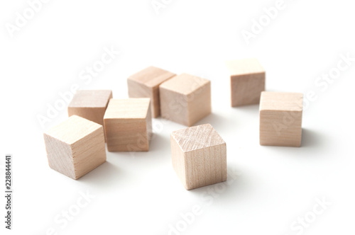 closeup of  piece of wooden brick of construction game on white background