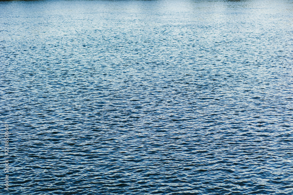 Obraz premium Beautiful waves on the black sea, close up. blue water