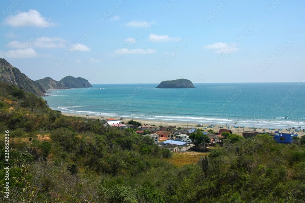 Fototapeta premium Fisherman village on the beach, small boats on the ocean. Ecuador
