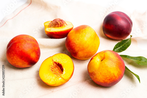 Fresh peach on white background top view