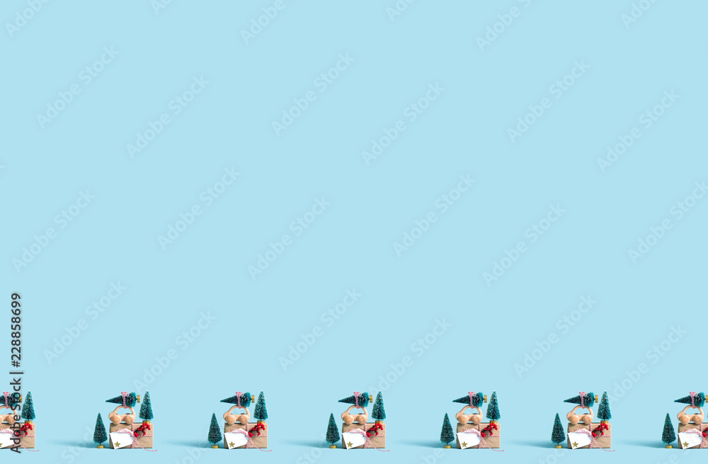 Toy car carrying a Christmas tree with gift box pattern Toy car carrying a Christmas tree with gift box pattern