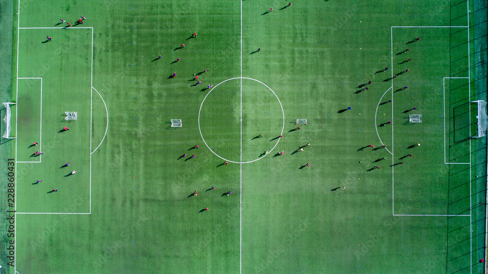 Aerial view of a soccer , football match. Football field and Footballers Aerial view of a soccer , football match. Football field and Footballers