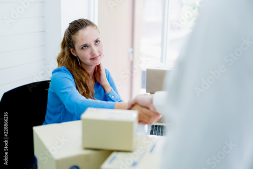 business delivery ideas concept with white shirt man sending brown box to caucasian woman with smile and happiness