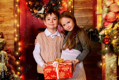 children with shristmas presents photo