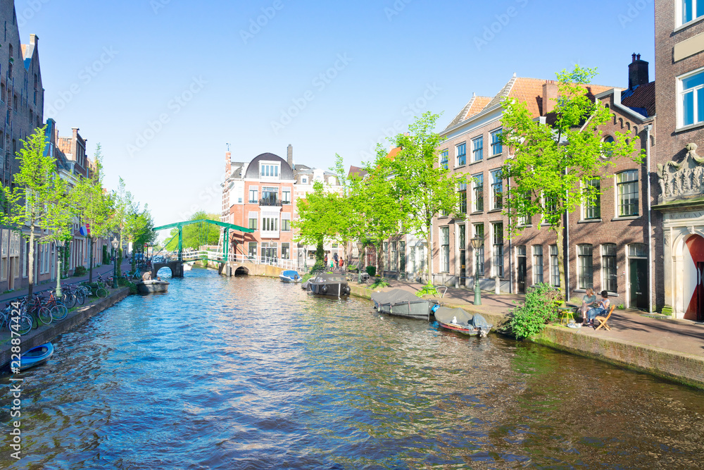 historical bridges and canals in old historical town of Leiden, Netherlands
