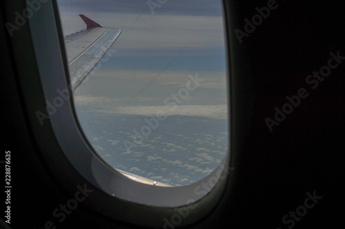 The window of the plane taken from the outside.