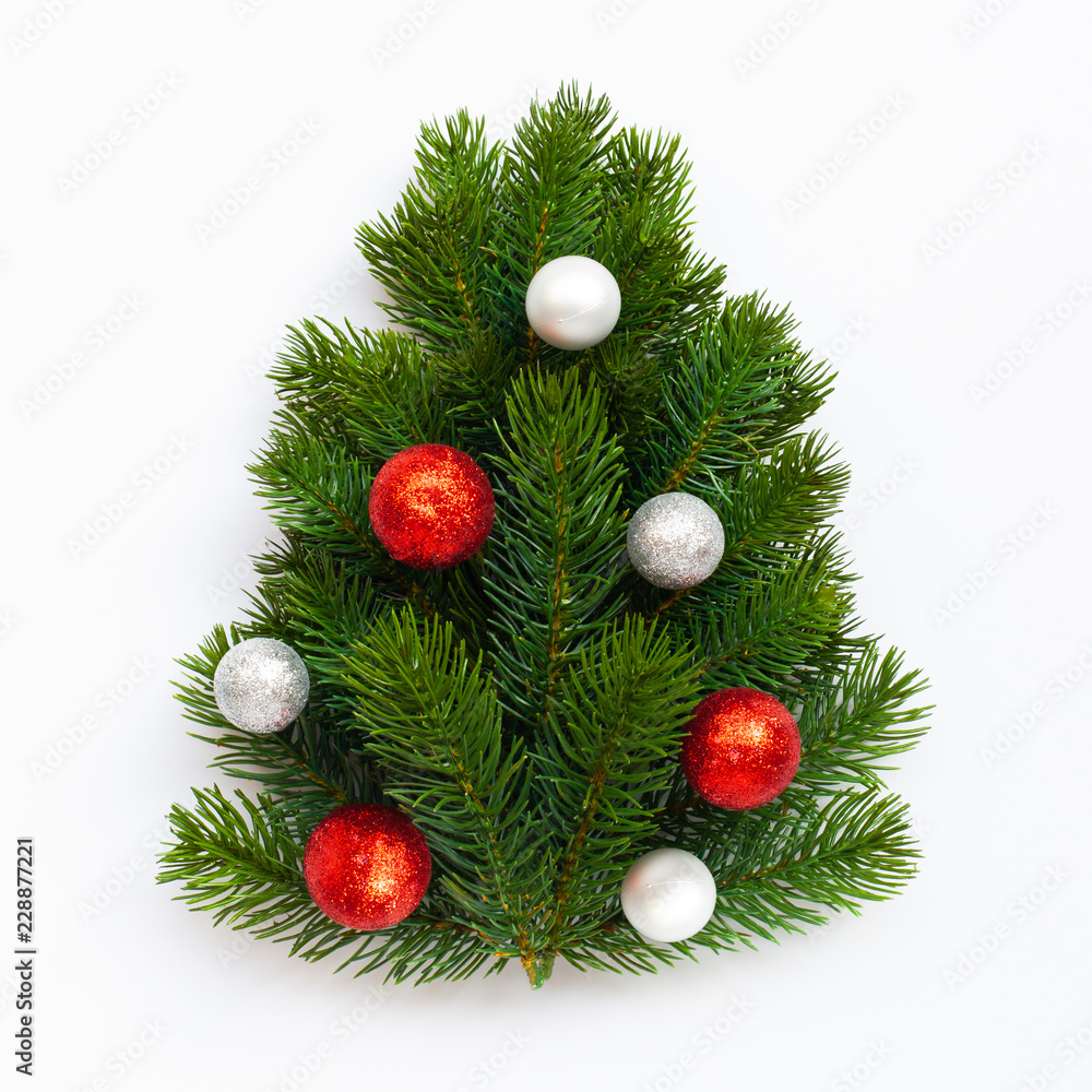 Christmas tree on white background. Christmas holiday celebration and new year concept. Top view Christmas tree on white background. Christmas holiday celebration and new year concept. Top view