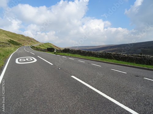 Winding road in the Peak District - Derbyshire, England, UK