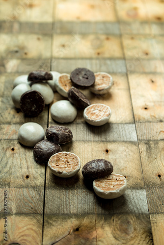 sweet, chocolate gingerbreads on wooden background