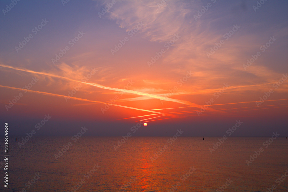 sunset over the sea,horizon,sky,light,reflection,red,sun,panorama,orange,calm,view,