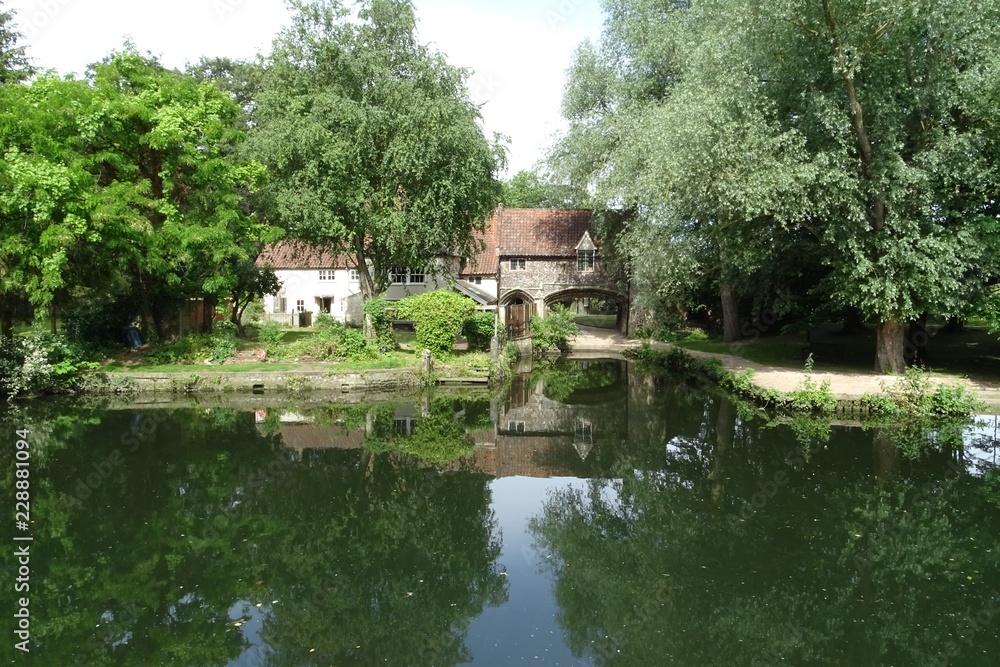 Summer reflections at Pulls Ferry - Norwich, Norfolk, England, UK