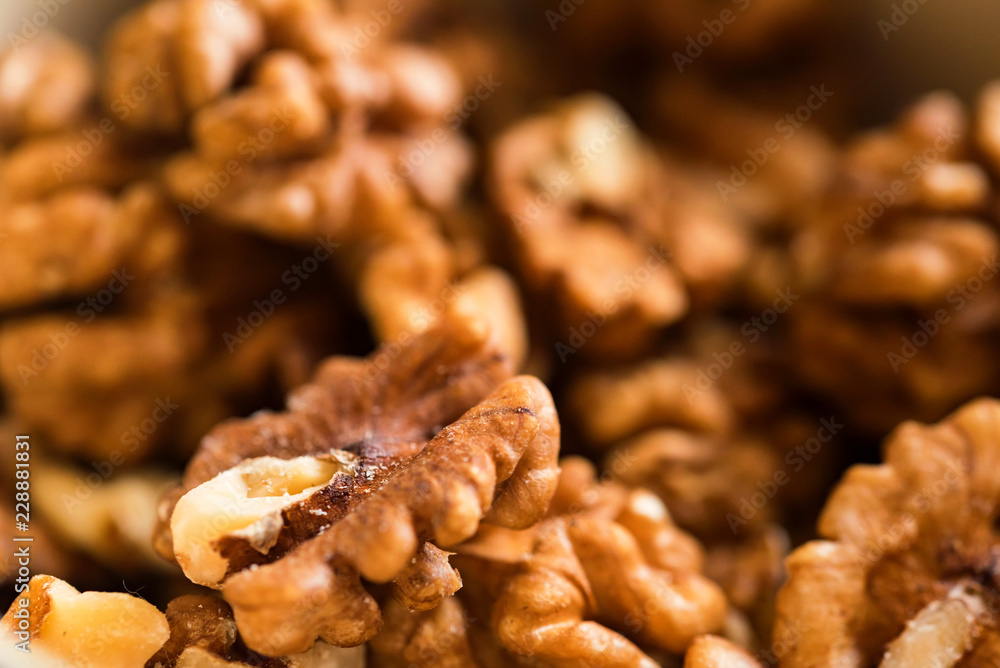 Background of unpeeled tasty walnuts close up Background of unpeeled tasty walnuts close up