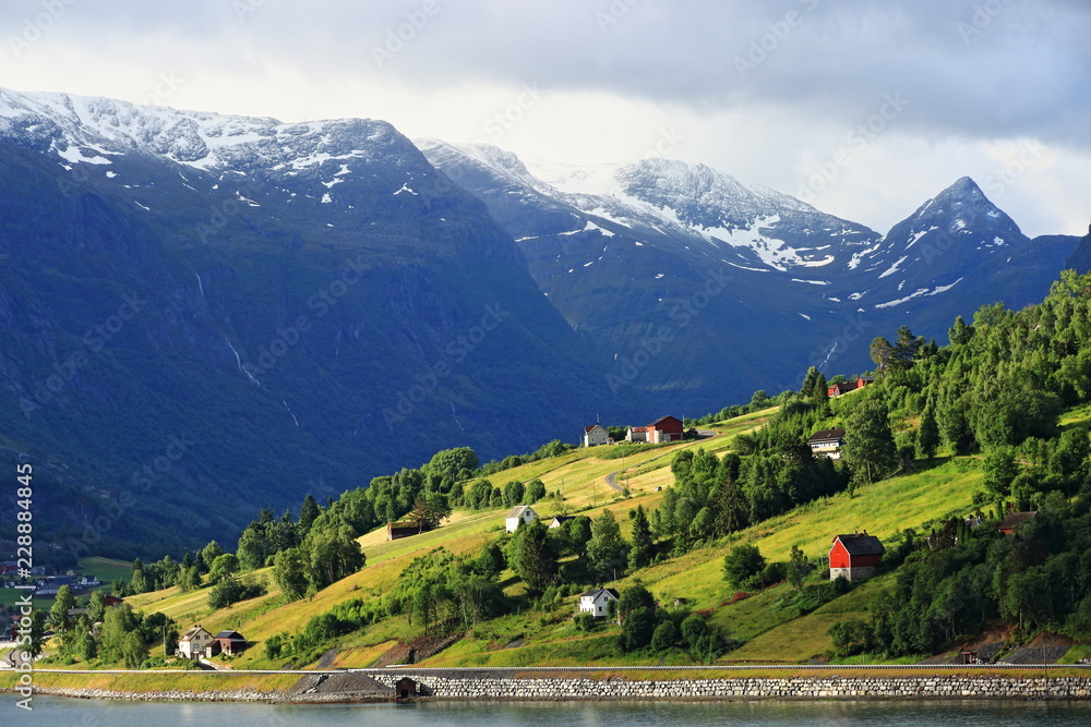 A color image of the Norwegian landscape as seen from the balcony of a cruise ship while cruising the Norwegian Fjords.