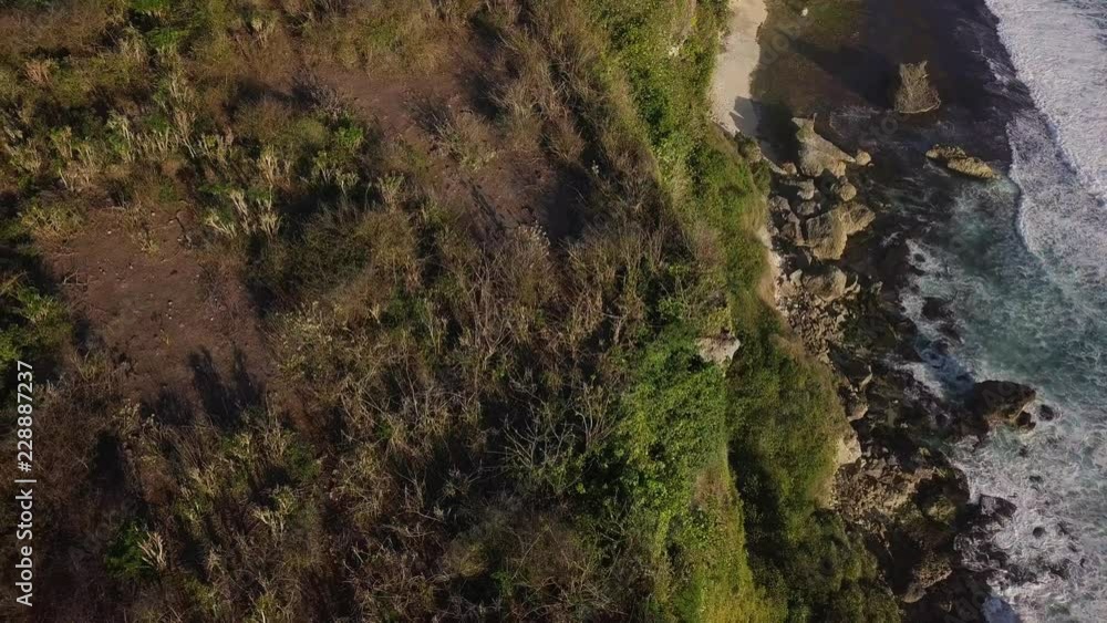 Aerial shooting of a beautiful cliff in Bali Aerial shooting of a beautiful cliff in Bali
