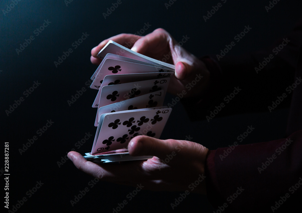 magician hands with playing cards - obrazy, fototapety, plakaty 