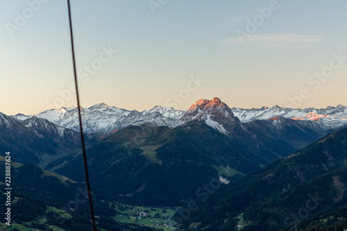 Kirchberg in Tirol, Tirol/Austria - September 27 2018: Sunrise flight with hot air balloon over Austrian Alps in Tirol