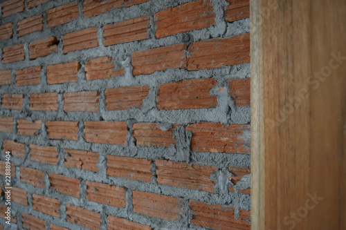 bricklayer wall and wood on Background 