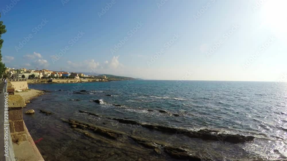 Alghero seafront on a clear spring day. Sardinia, Italy Alghero seafront on a clear spring day. Sardinia, Italy