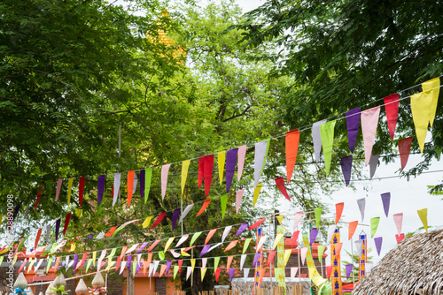 Fototapeta Naklejka Na Ścianę i Meble -  Colorful bunting in outdoor summer festival
