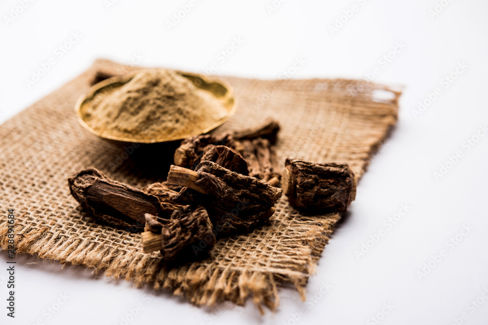 Hemidesmus indicus also known as Ananthamoola or Naruneendi or Nannari in dried steam and powder form. It's a useful Ayurvedic medicine from India Hemidesmus indicus also known as Ananthamoola or Naruneendi or Nannari in dried steam and powder form. It's a useful Ayurvedic medicine from India