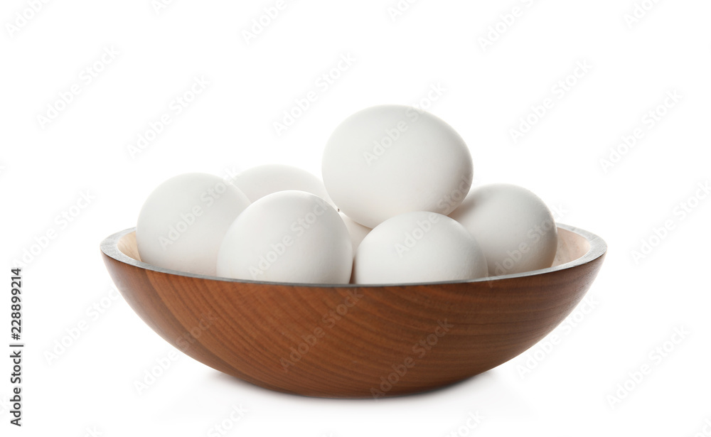 Bowl with raw chicken eggs on white background Bowl with raw chicken eggs on white background