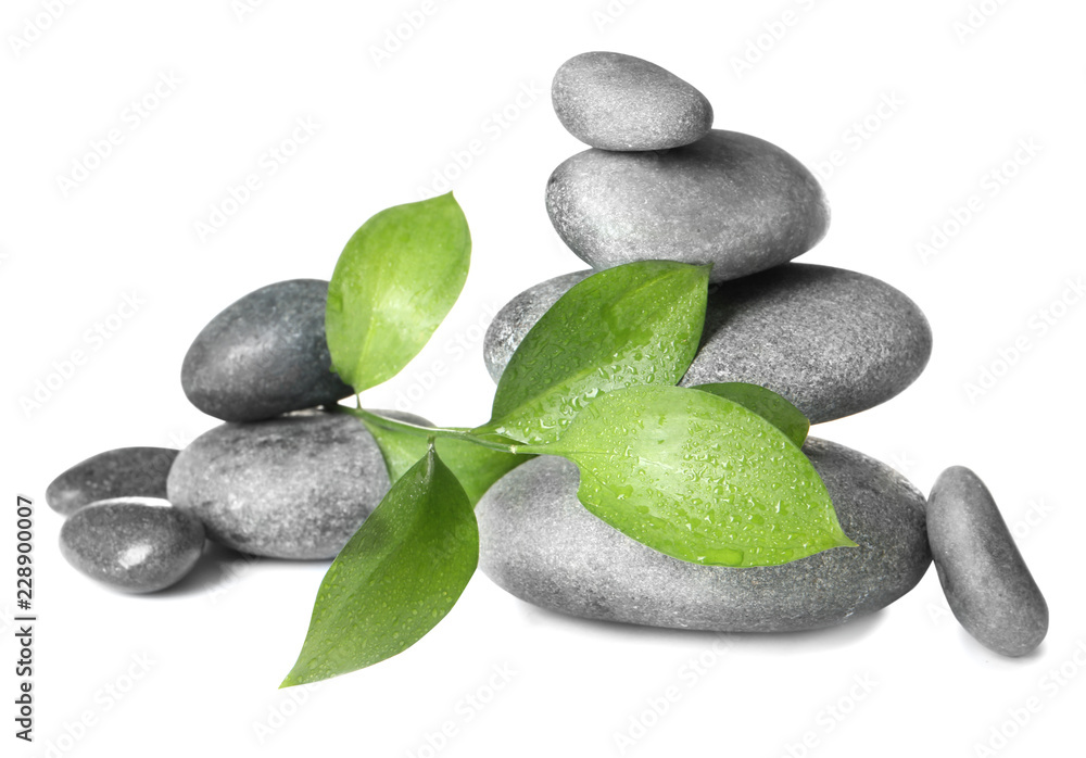 Composition with spa stones on white background Composition with spa stones on white background
