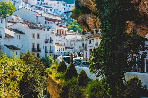 Buildings constructed under huge large rocks in Setenil de las Bodegas, Spain photo