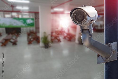 Security CCTV camera installed indoor. Intelligent cameras can record video all day and night to keep you safe from thieves. Surveillance Anti-theft system.