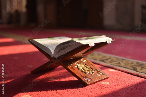 Al Quran opened in mosque photo
