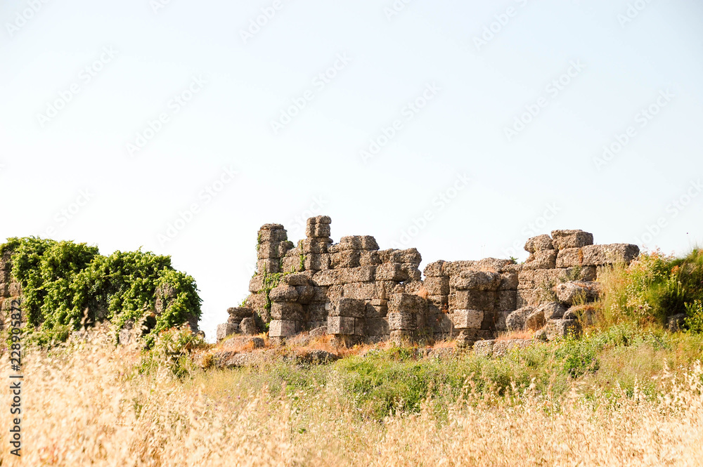 The ruins of the ancient city in Side Turkey. Stone blocks.