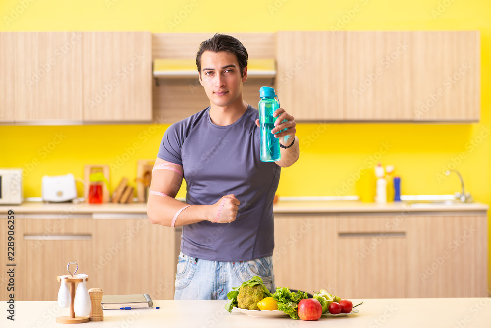 Young man in dieting and healthy eating concept Young man in dieting and healthy eating concept