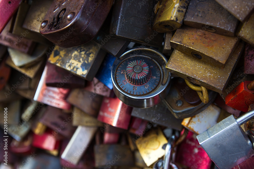 Padlocks on the bridge. Cologne, Germany. Detail view of padlocks from couples at the Hohenzollern Bridge. Padlocks on the bridge. Cologne, Germany. Detail view of padlocks from couples at the Hohenzollern Bridge.