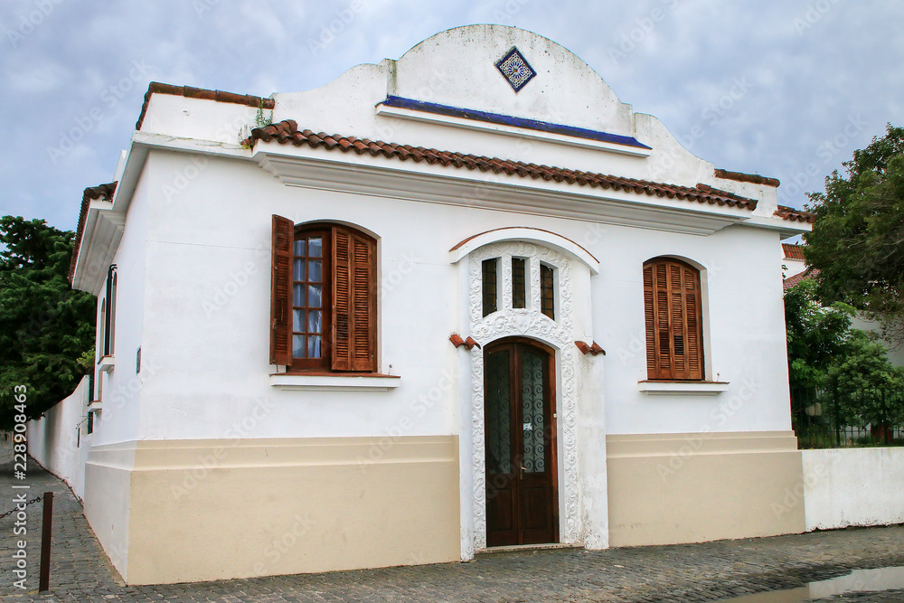 White colonial house in historic quarter of Colonia del Sacramento, Uruguay.