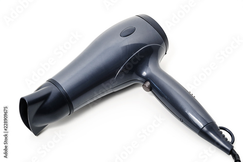 Black hair dryer on white background. View in perspective.