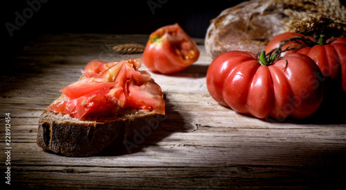 Tomatoes and bruschetta with tomatoes