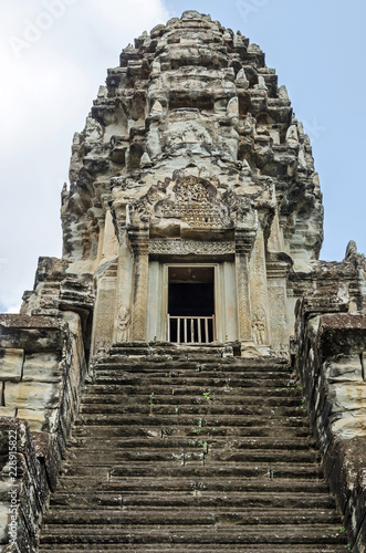 Tower of Angkor Wat with the steep stairways photo