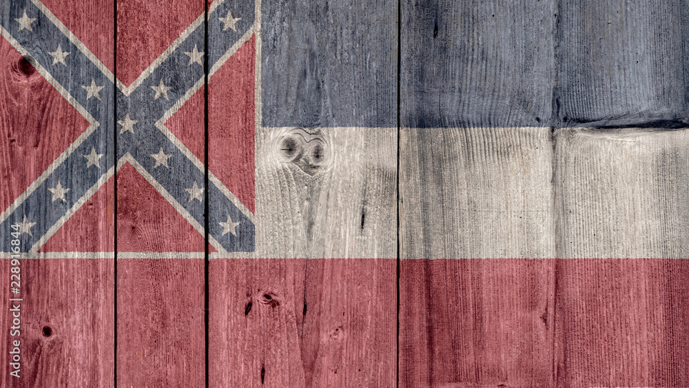 USA Politics News Concept: US State Mississippi Flag Wooden Fence USA Politics News Concept: US State Mississippi Flag Wooden Fence
