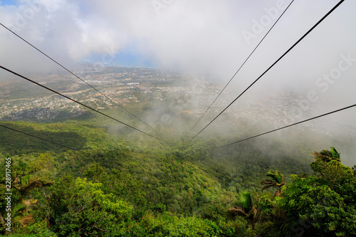 View from the cable car to the jungle with fog. Mount Isabel de Torres, Puerto Plata, Dominican Republic.