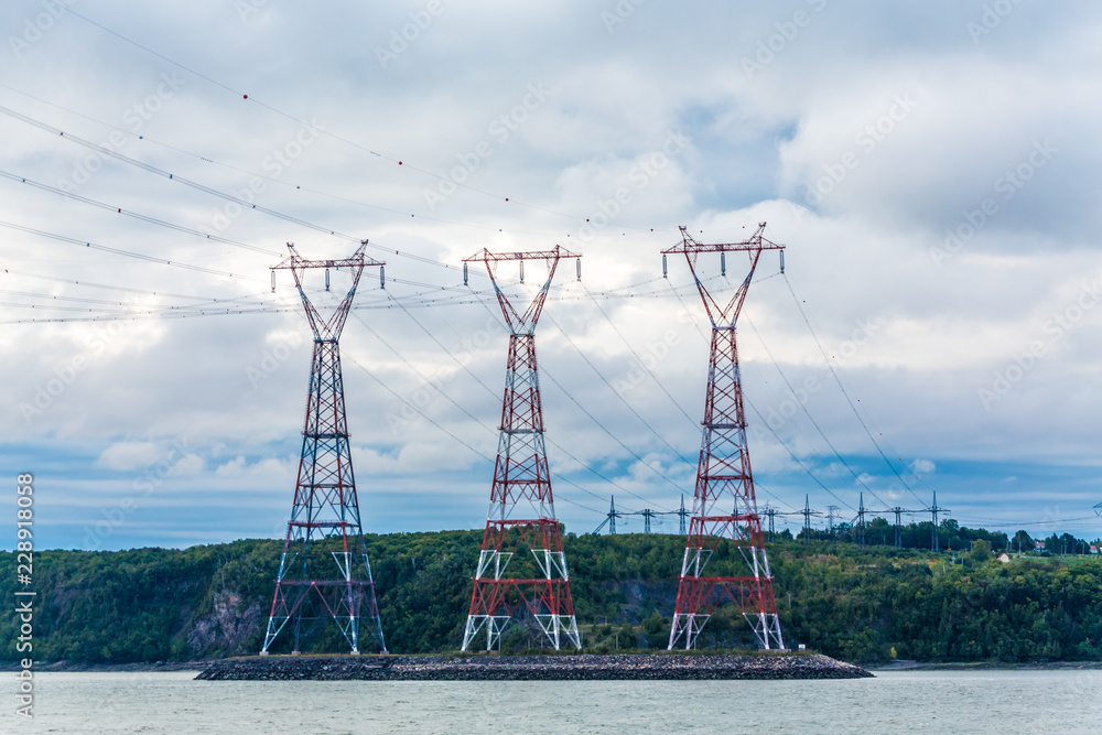 Three Power Pylons by River