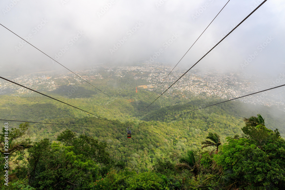 View from the cable car to the jungle with fog. Mount Isabel de Torres, Puerto Plata, Dominican Republic.