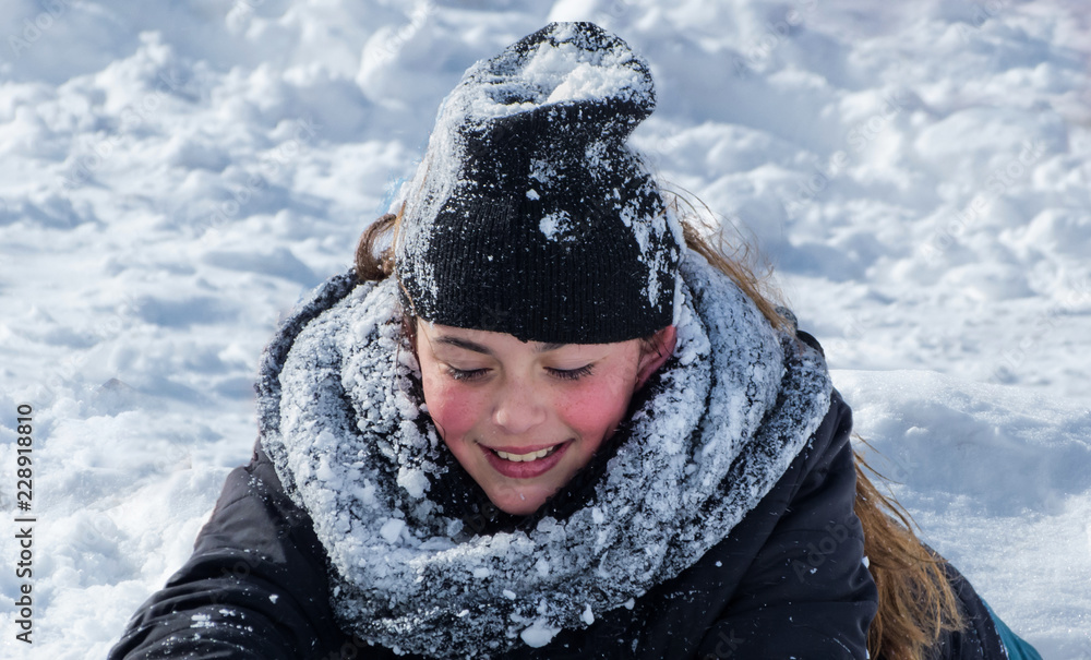 portrait of a child playing in the snow portrait of a child playing in the snow