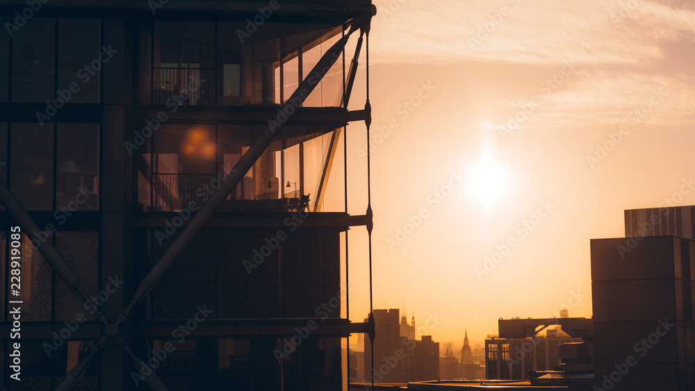 silhouette of building at sunset silhouette of building at sunset