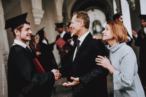 Corridor. Mother. Father. Son. Parents. Relations. photo