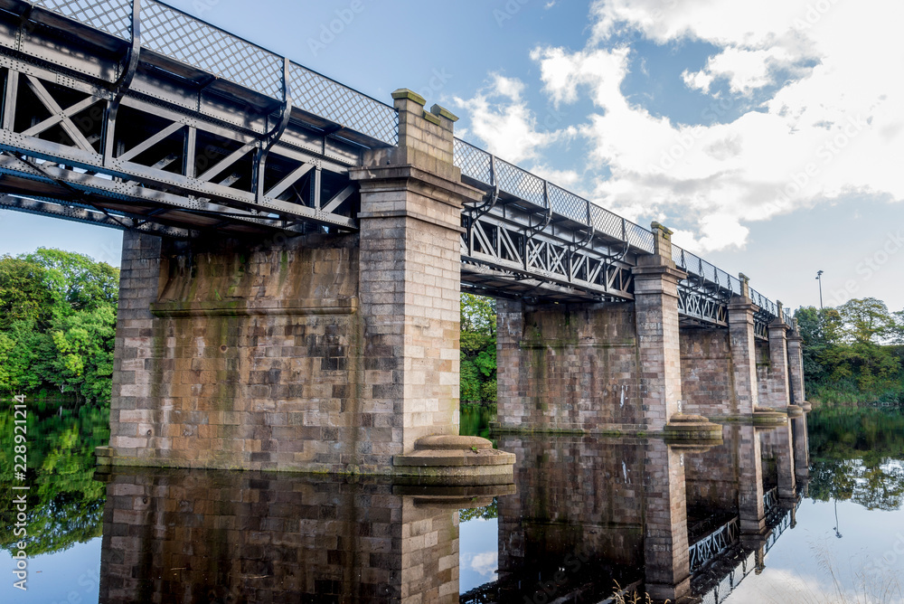 A view of scenic railway bridge crossing river Dee near Duthie park, Aberdeen, Scotland A view of scenic railway bridge crossing river Dee near Duthie park, Aberdeen, Scotland