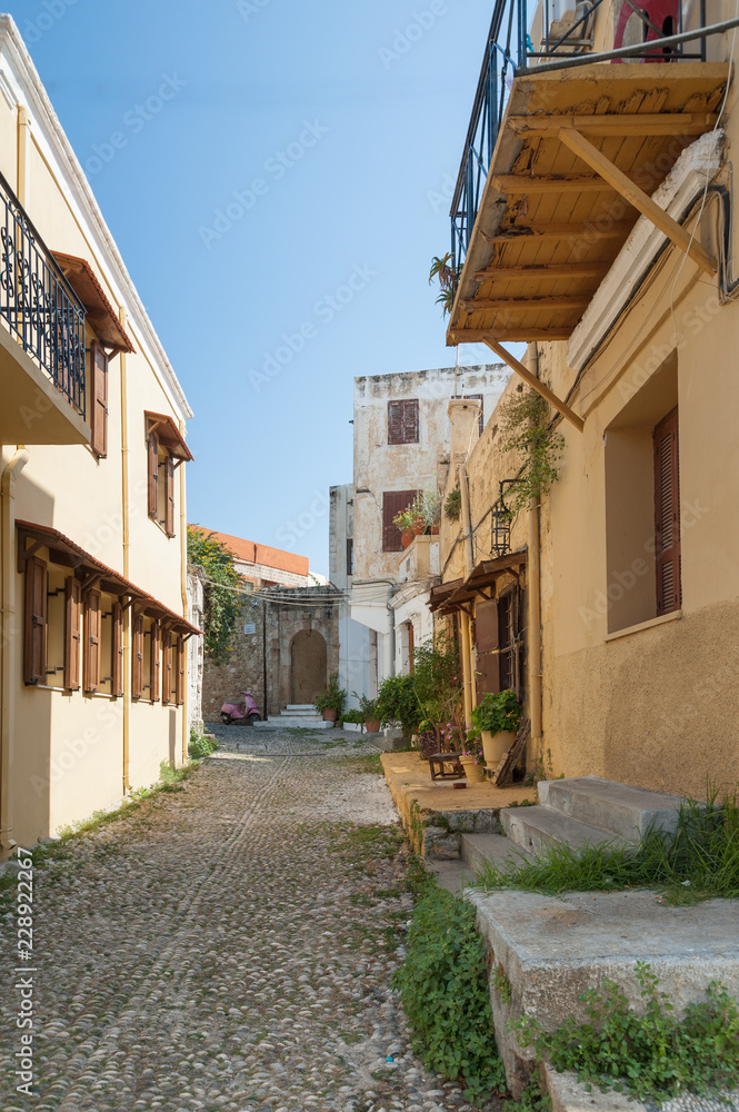 Residential alley and dwellings in old town.  Rhodes, Old Town, Island of Rhodes, Greece, Europe.