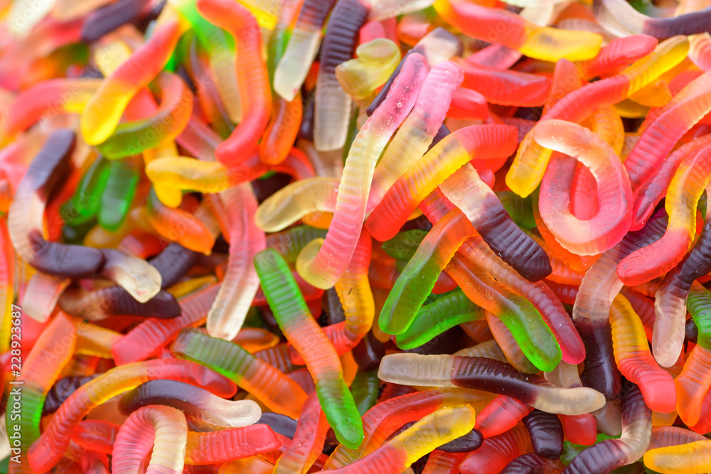 colorful worm shaped candies, sweet background